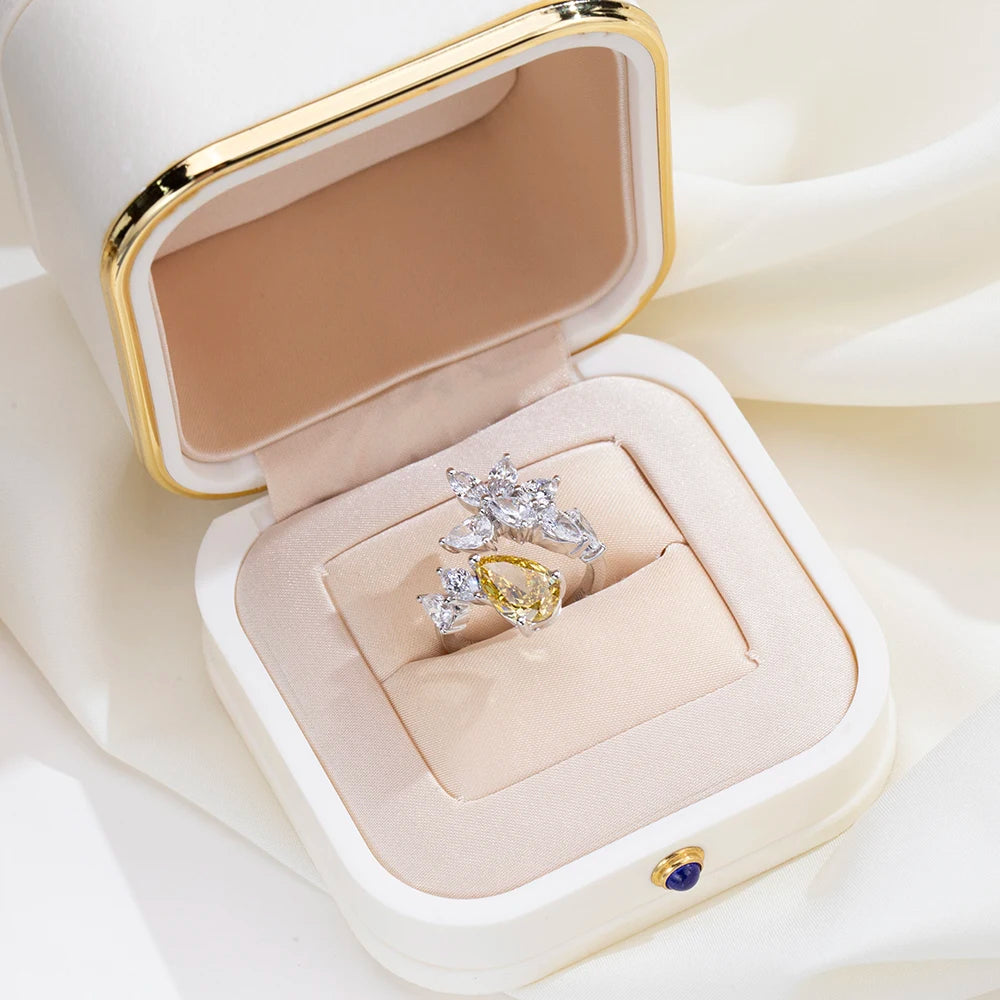 THE PEAR CUT 5.60 CARAT ESSENCE INFINITY RING | 18K GOLD