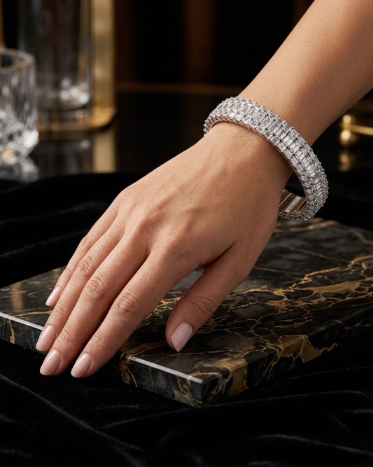 26.84CT EMERALD CUT DIAMONDS WIDE STRETCH BRACELET | 37.7G 18K WHITE GOLD
