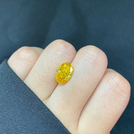3.38 CARAT FANCY VIVID ORANGY YELLOW OVAL LAB DIAMOND | IGI CERTIFIED